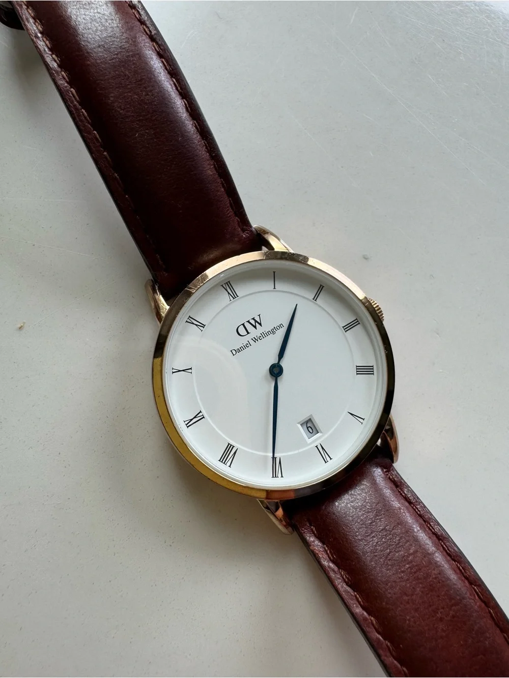 Daniel Wellington White Dial Watch with Gold Case and Brown Leather Strap